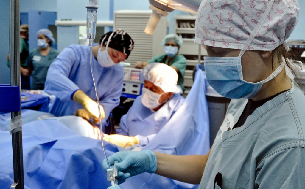 surgeons performing heart surgery